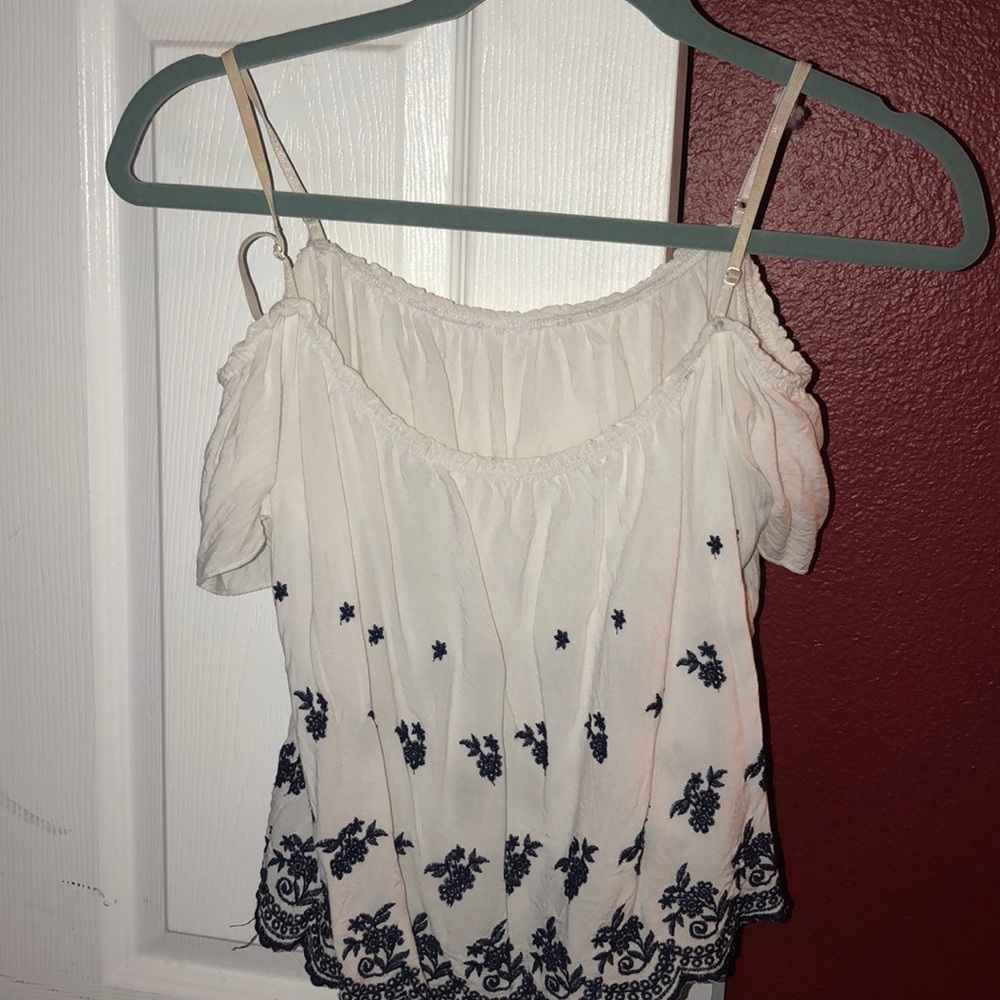 White and blue off the shoulder shirt